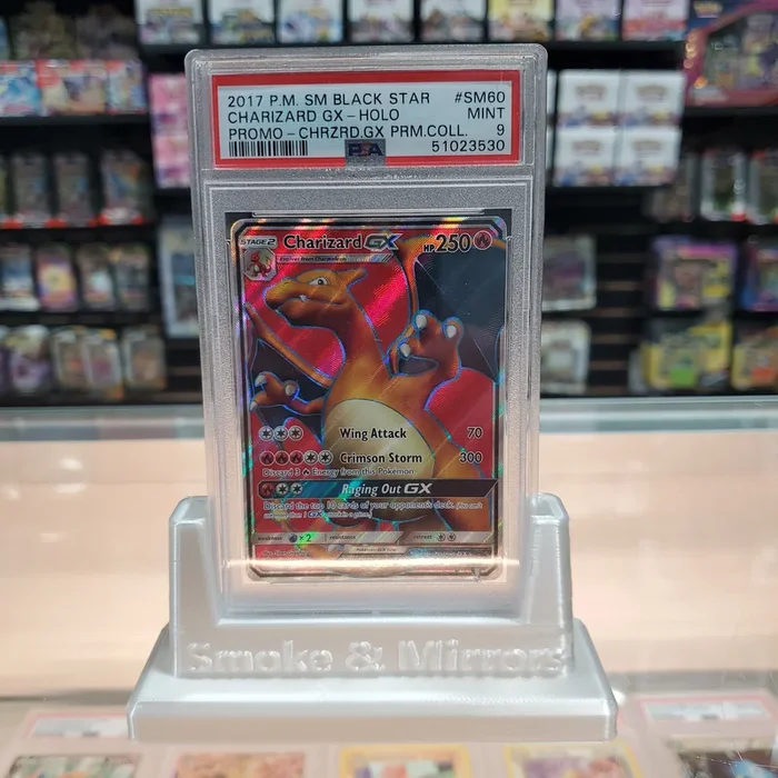 Charizard GX (SM60) [Sun & Moon: Black Star Promos] PSA 9